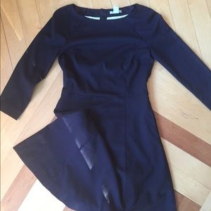 Structured boat neck dress with zipped back